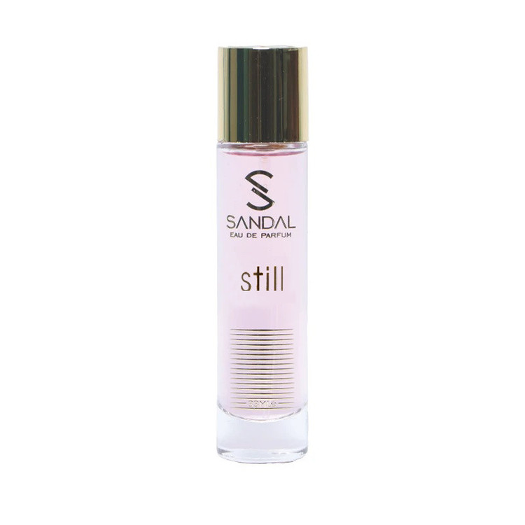 عطر جیبی زنانه صندل مدل still jennifer lopez با رایحه گلی و تند حجم 33 میلیلیتر